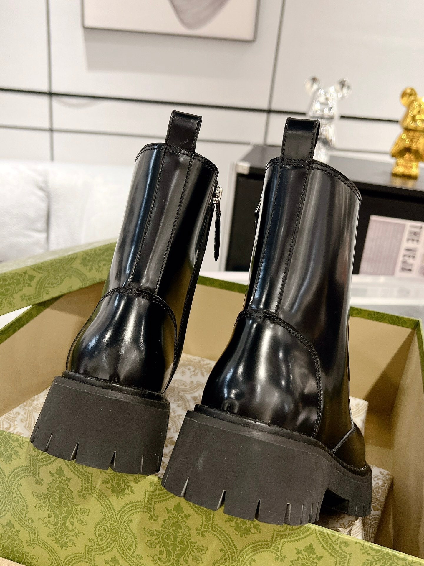 GUCCI WEB ANKLE BOOTS IN BLACK CALFSKIN