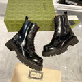 GUCCI WEB ANKLE BOOTS IN BLACK CALFSKIN