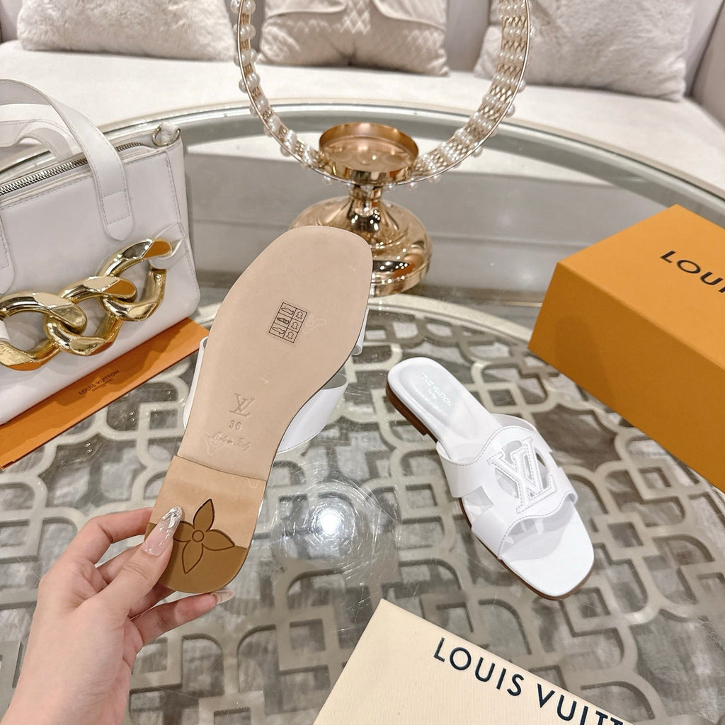 LOUIS VUITTON ISOLA FLAT SLIDE IN WHITE CALFSKIN