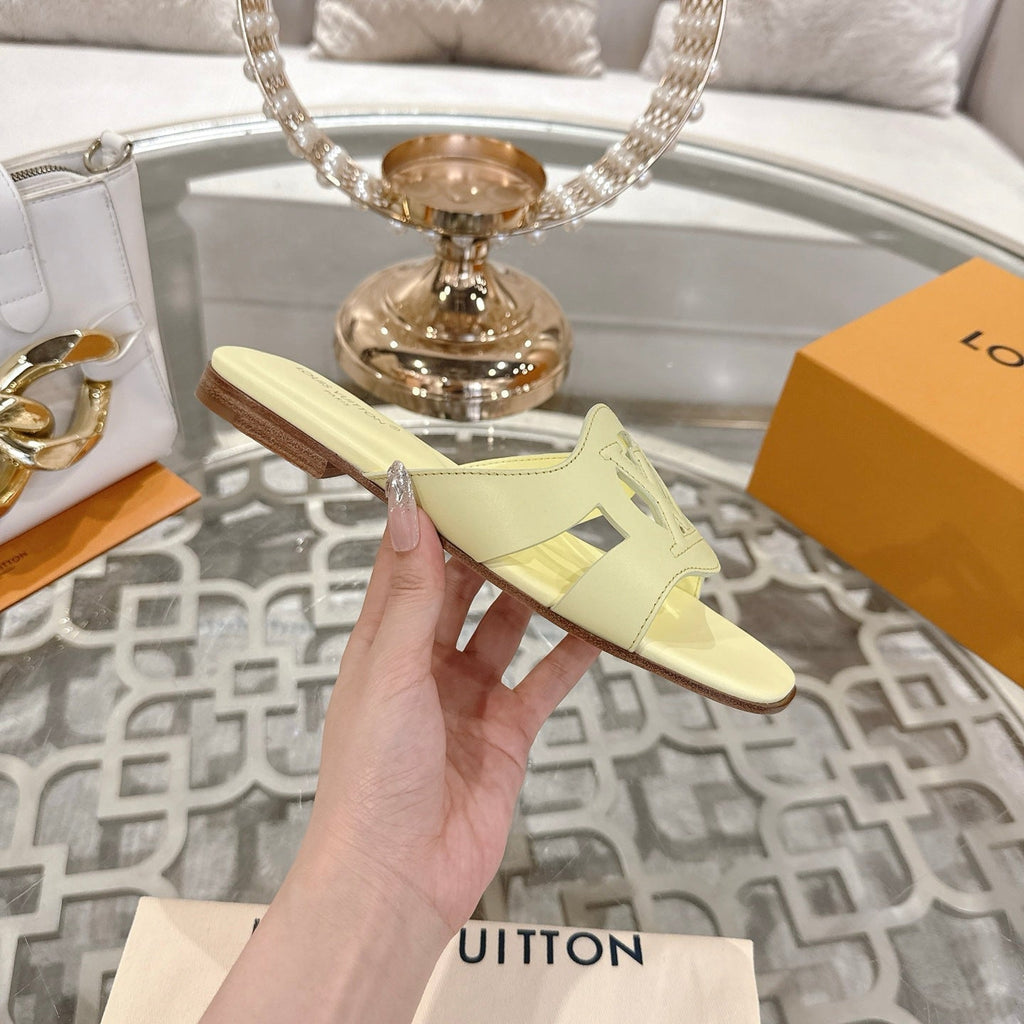 LOUIS VUITTON ISOLA FLAT SLIDE IN PALE YELLOW CALFSKIN