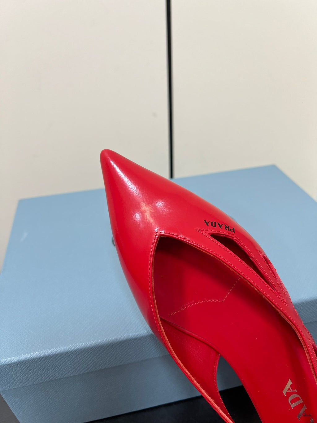 PRADA BRUSHED CUT-OUT BALLERINA FLAT IN RED CALFSKIN