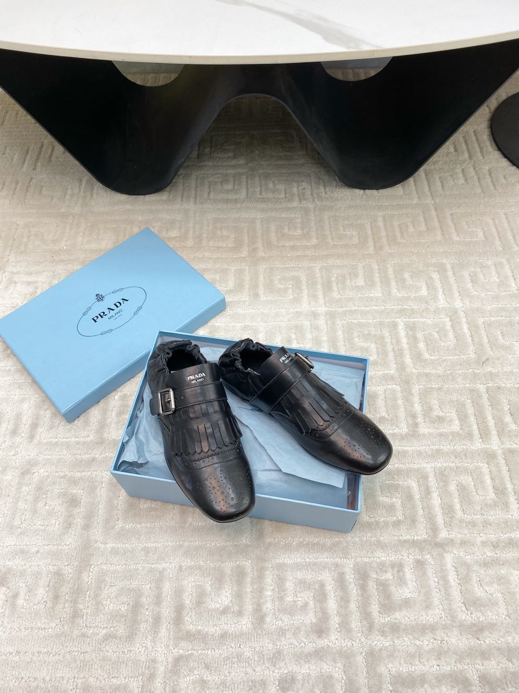 PRADA TASSEL LOAFERS IN BLACK LAMBSKIN