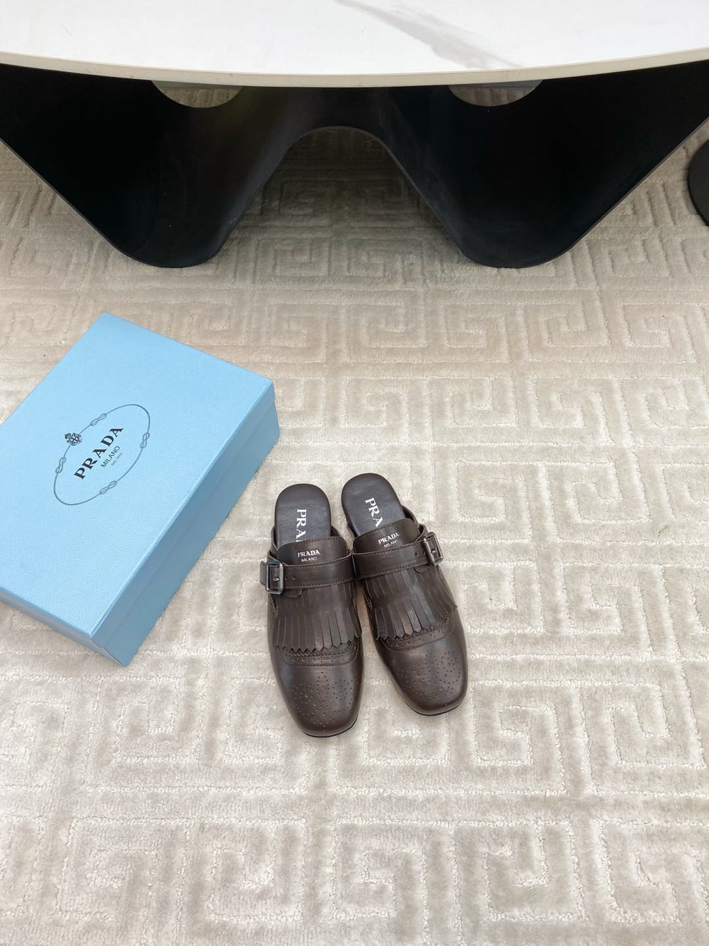PRADA TASSEL MULES IN WALNUT BROWN LAMBSKIN