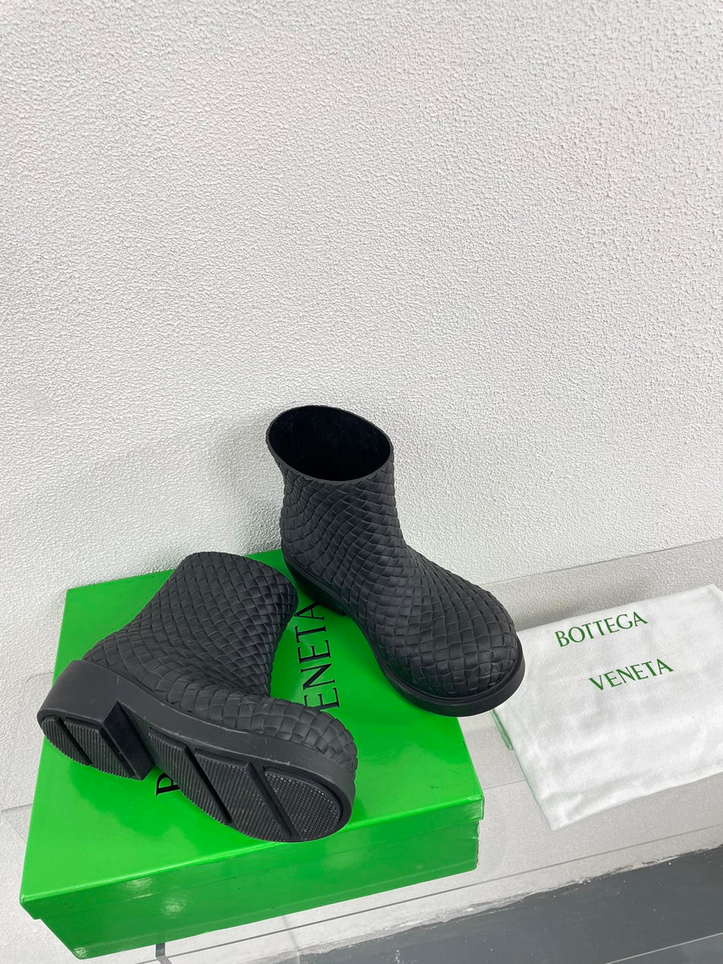 BOTTEGA VENETA FIREMAN BOOTS IN BLACK RUBBER WITH ICONIC INTRECCIO MOTIF