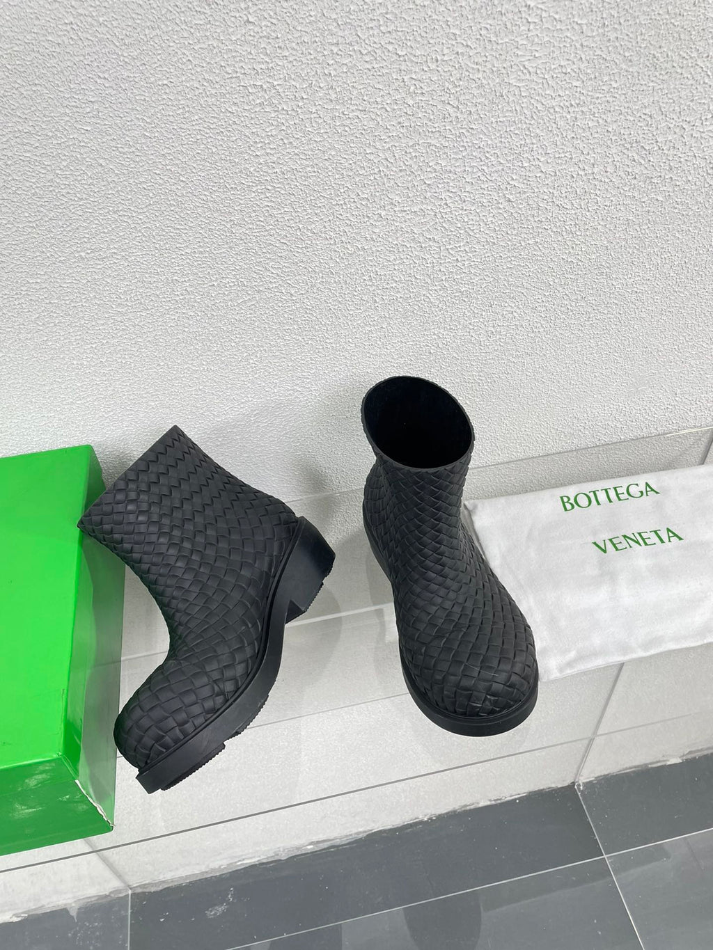 BOTTEGA VENETA FIREMAN BOOTS IN BLACK RUBBER WITH ICONIC INTRECCIO MOTIF