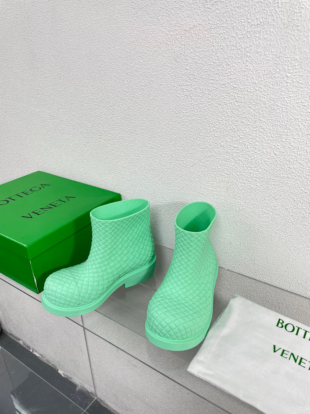 BOTTEGA VENETA FIREMAN BOOTS IN GREEN MINT RUBBER WITH ICONIC INTRECCIO MOTIF