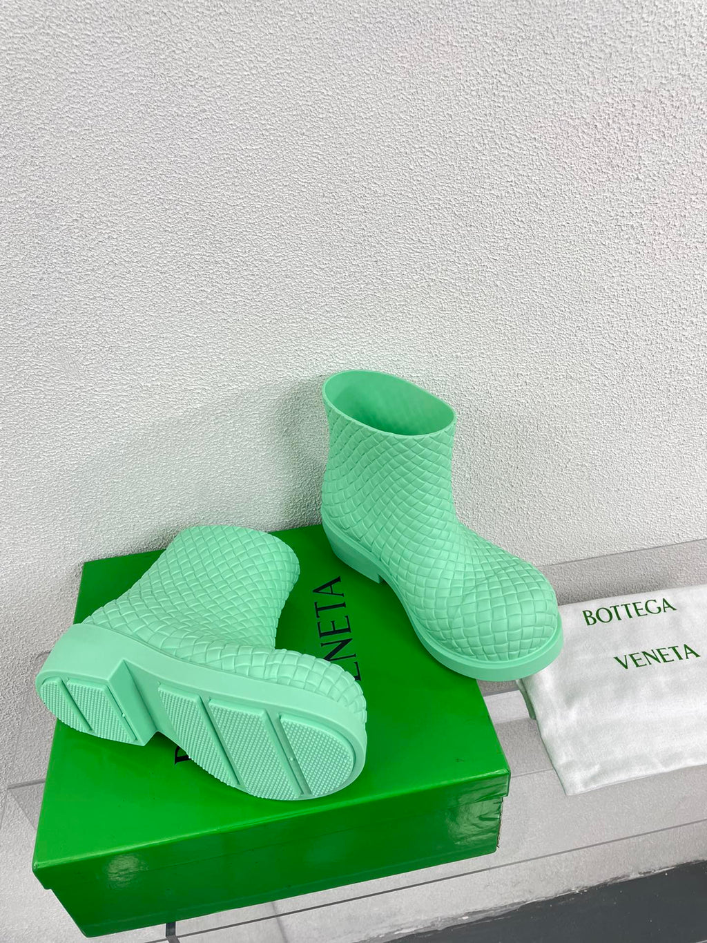 BOTTEGA VENETA FIREMAN BOOTS IN GREEN MINT RUBBER WITH ICONIC INTRECCIO MOTIF