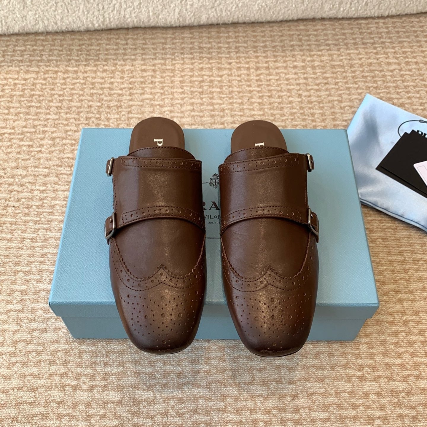 PRADA DOUBLE MONK MULES IN RK BROWN CALFSKIN