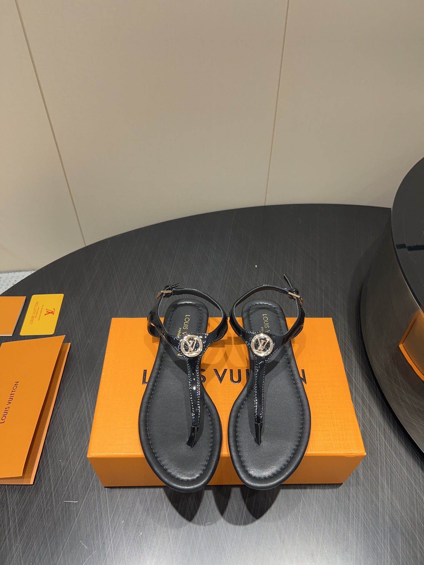 LOUIS VUITTON LV THONG SANDALS 25S IN BLACK CALFSKIN WITH GOLD HARDWARE