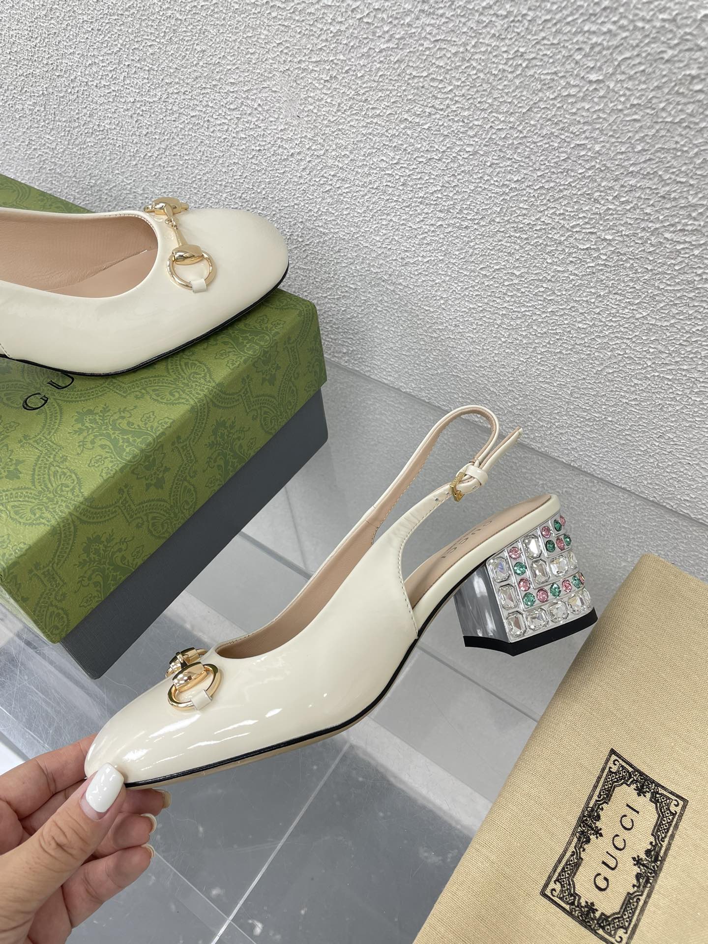 GUCCI WOMEN'S HORSEBIT SLINGBACK IN WHITE CALFSKIN WITH RHINSTONES
