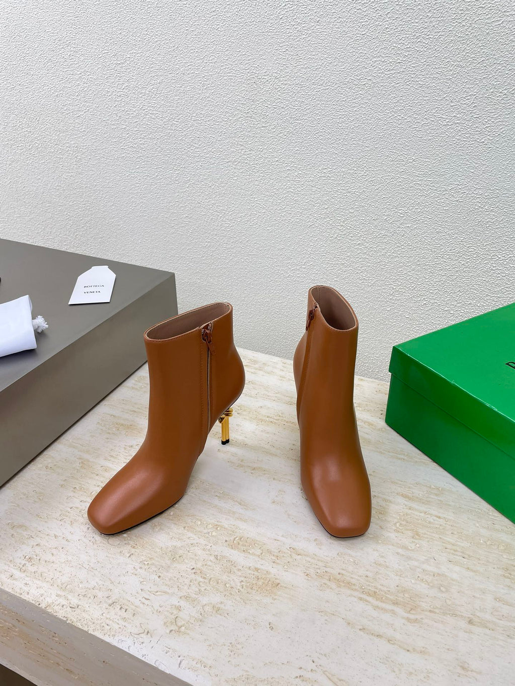 BOTTEGA VENETA KNOT ANKLE BOOT IN BRONZE BROWN CALFSKIN WITH GOLD METAL HEEL 9 CM