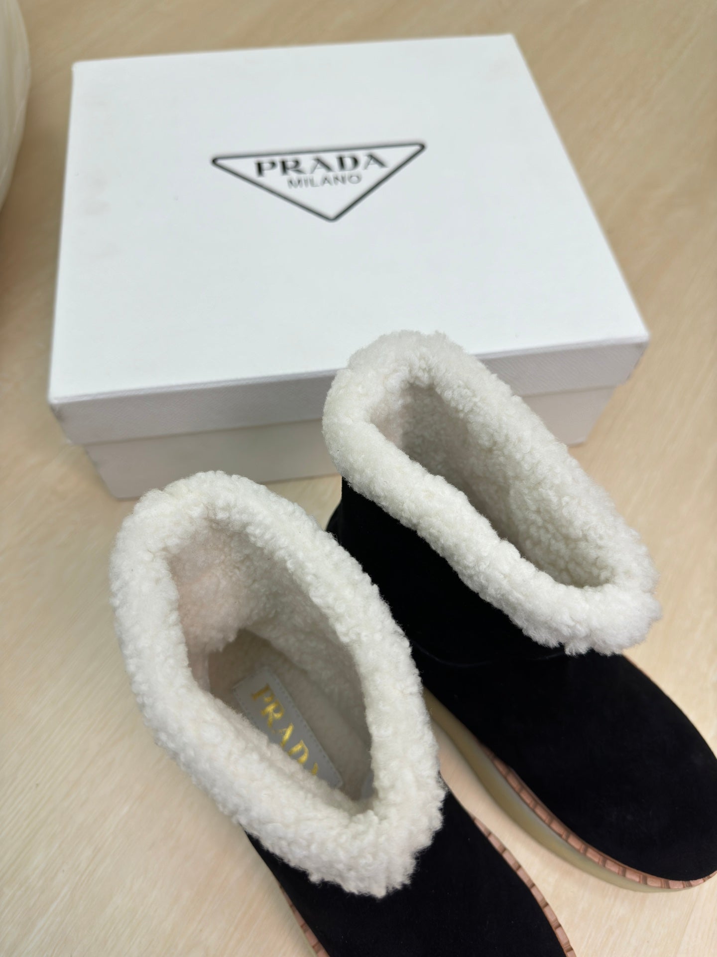 PRADA SUEDE BOOTS BLACK WITH SHEARLING LINING AND RUBBER FLATFORM SOLE
