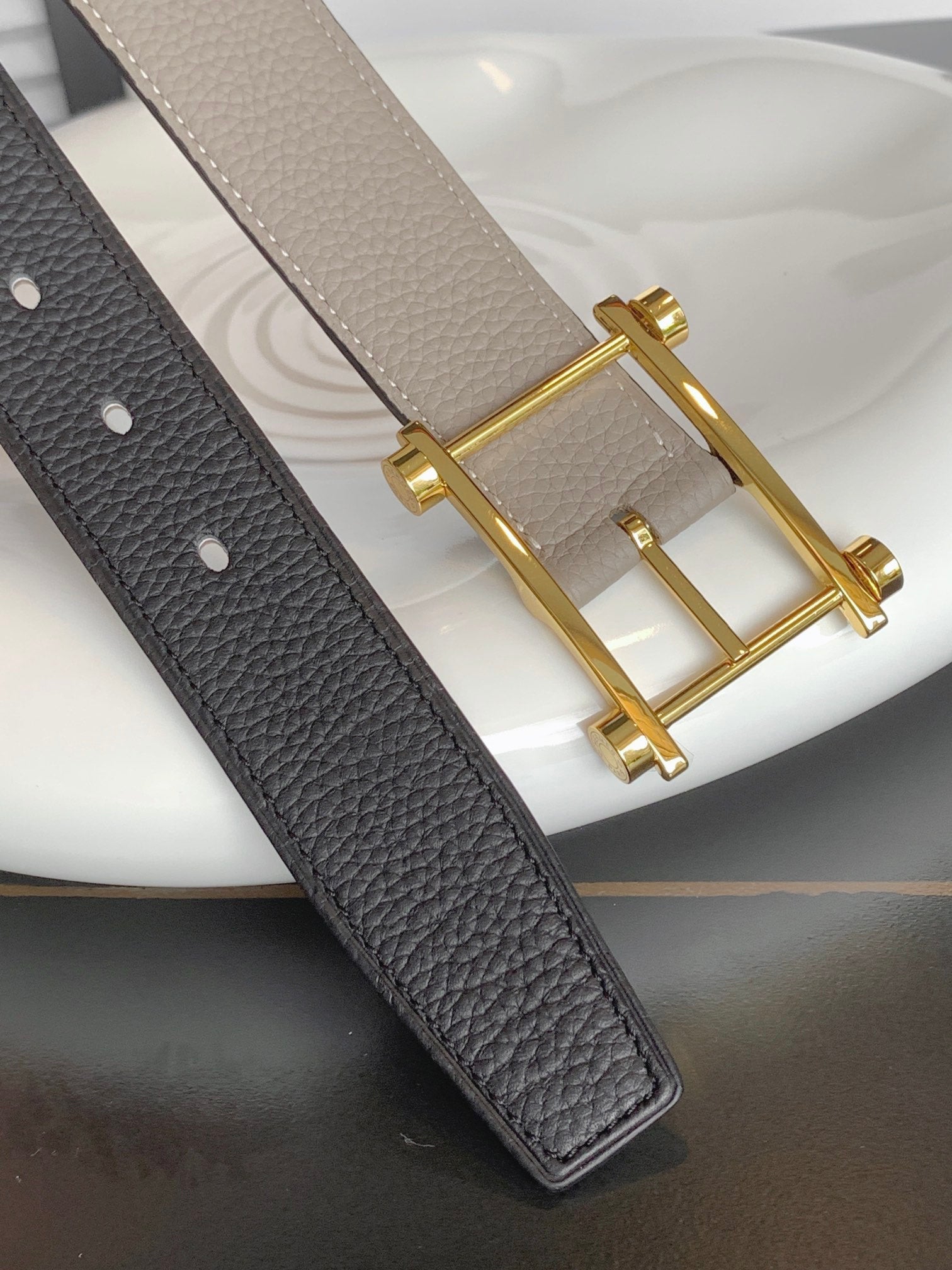 HERMES REVERSIBLE BLACK AND BLACK AND KHAKI BROWN LEATHER STRAP 32 MM GOLD HARDWARE