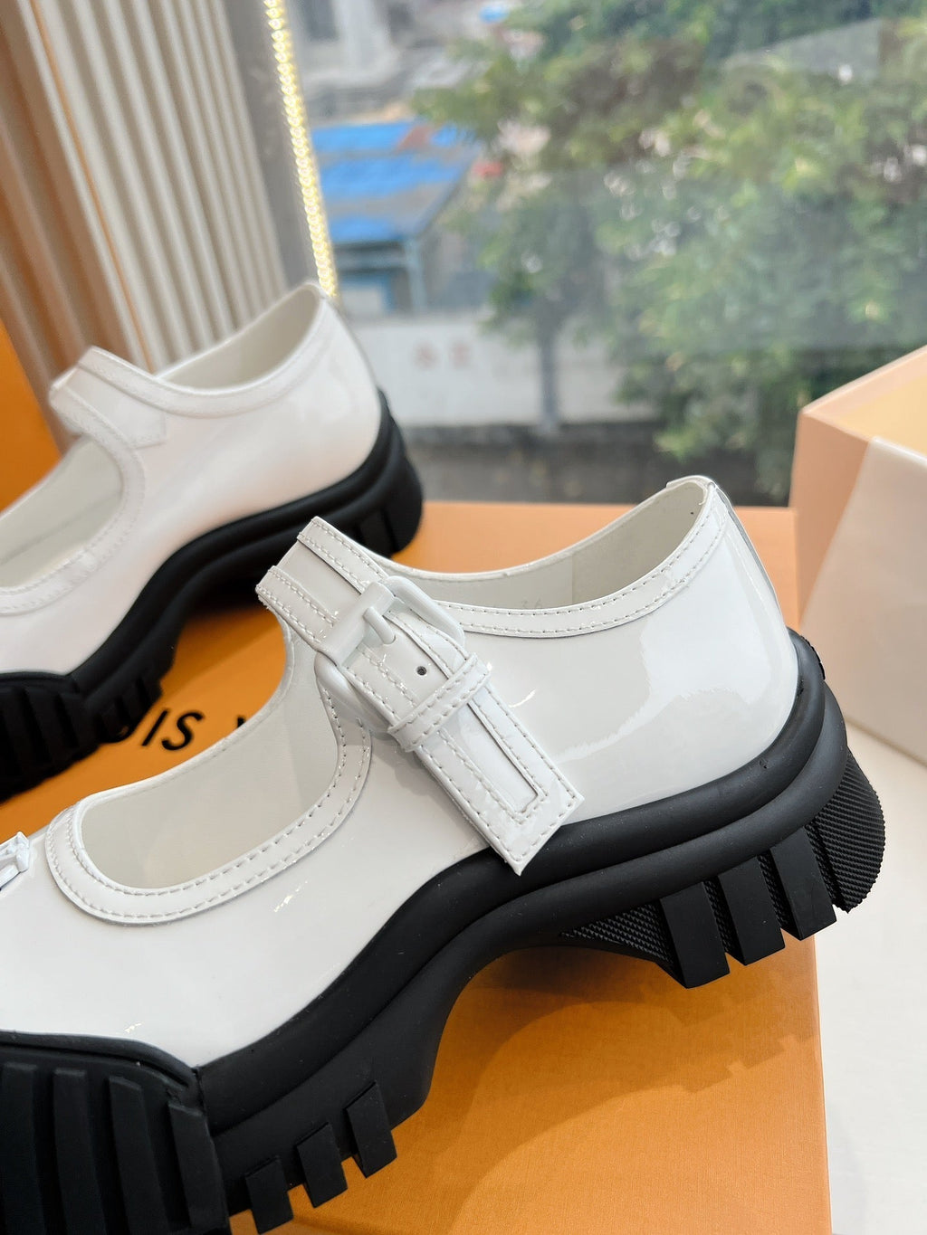 LOUIS VUITTON RUBY FLAT MARY JANE IN WHITE PATENT CALFSKIN