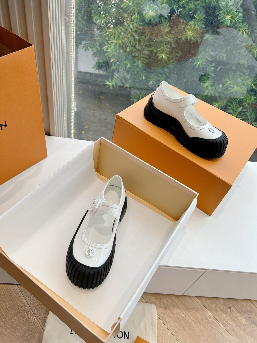 LOUIS VUITTON RUBY FLAT MARY JANE IN WHITE PATENT CALFSKIN