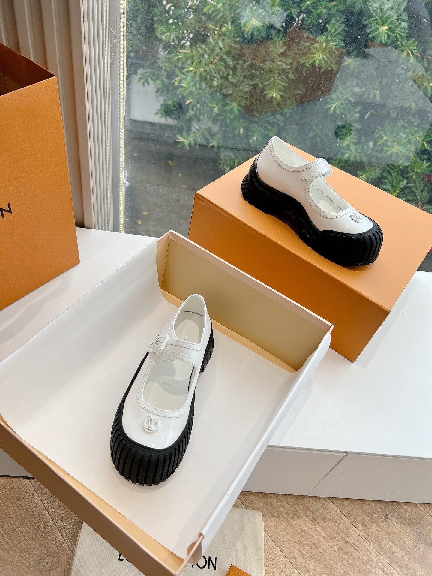 LOUIS VUITTON RUBY FLAT MARY JANE IN WHITE PATENT CALFSKIN