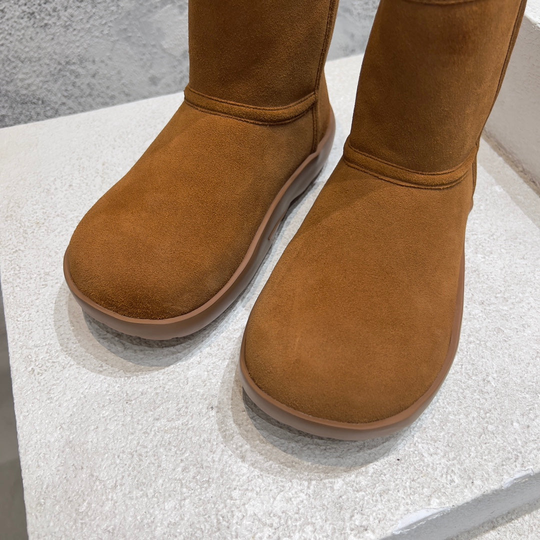 BOTTEGA VENETA SNAP ANKLE BOOT IN BRONZE BROWN SUEDE AND SHEARLING LINING