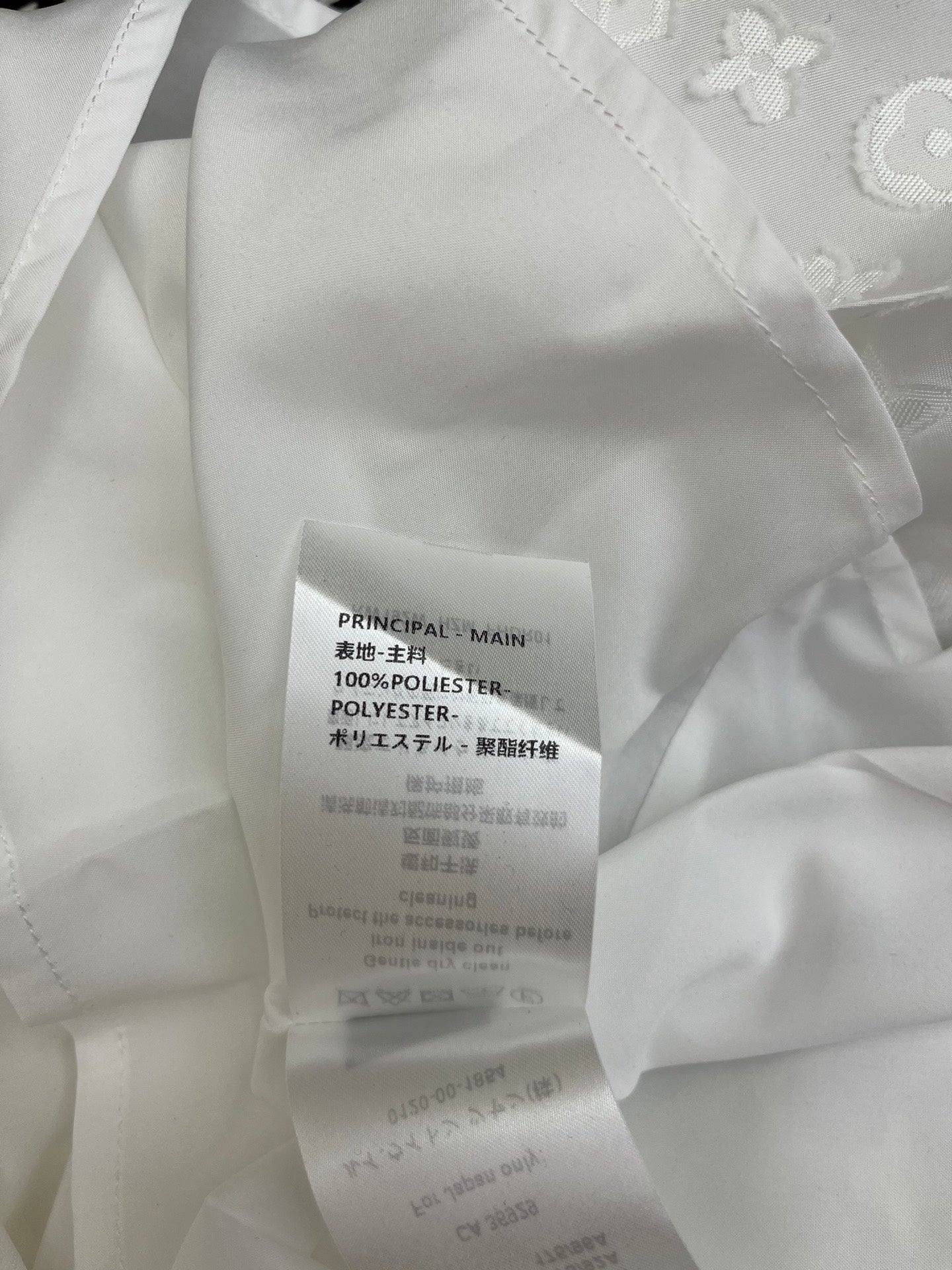 LOUIS VUITTON WHITE EMBOSSED LOGO DRESS