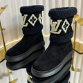 LOUIS VUITTON SNOWDROP FLAT ANKLE BOOTS IN BLACK SUEDE