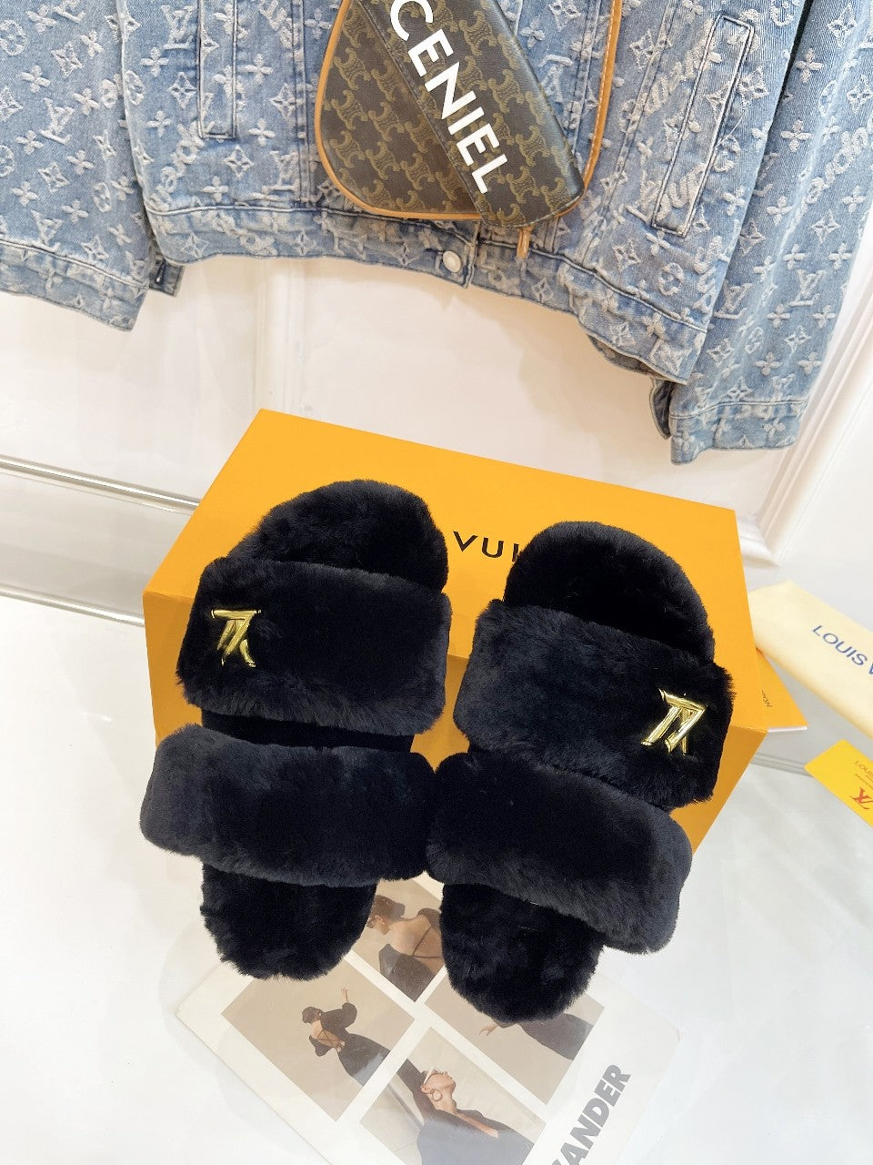 LOUIS VUITTON HALF MULE SLIPPERS IN BLACK FLEECE FEATURING METALLIC LOGO