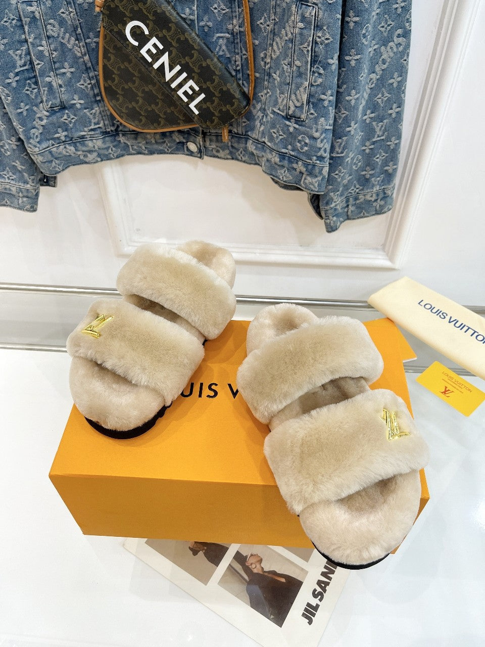 LOUIS VUITTON HALF MULE SLIPPERS IN CAMEL BEIGE FLEECE FEATURING METALLIC LOGO