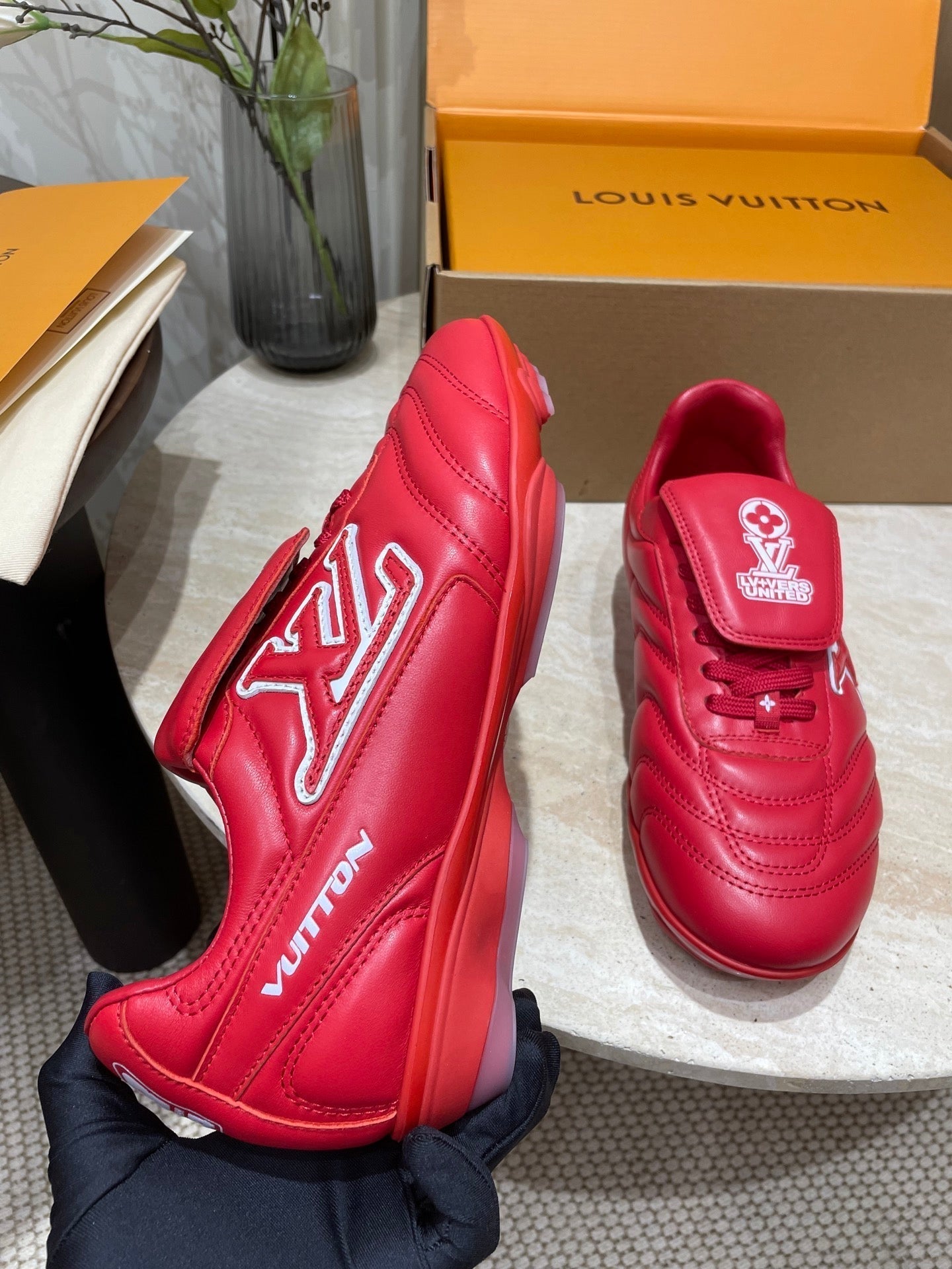 LOUIS VUITTON FOOTPRINT SOCCER SNEAKER IN CHERRY RED CALFSKIN