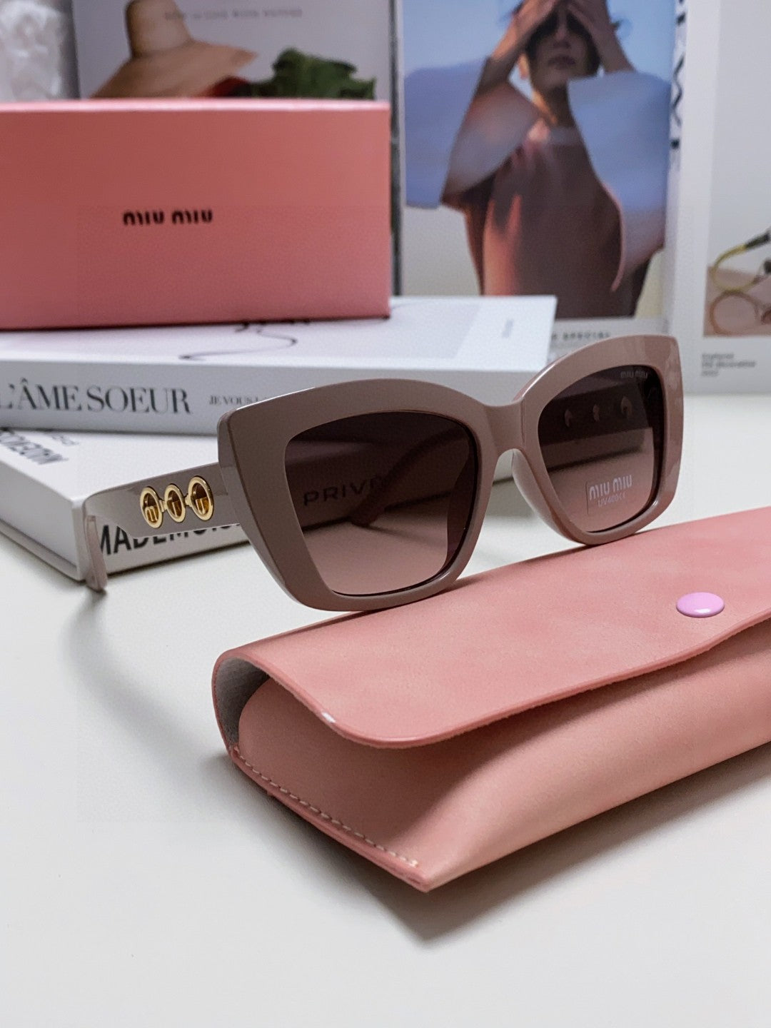LOGO CAT EYE SUNGLASSES 513003 IN NUDE ACETATE