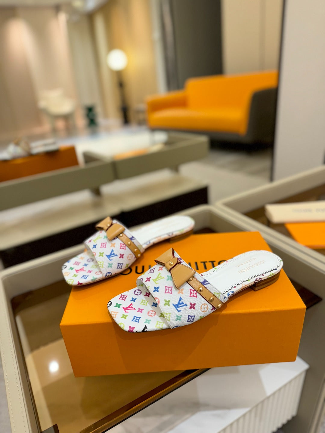 LOUIS VUITTON LV X TM 6AM FLAT MULE IN WHITE MONOGRAM CALFSKIN