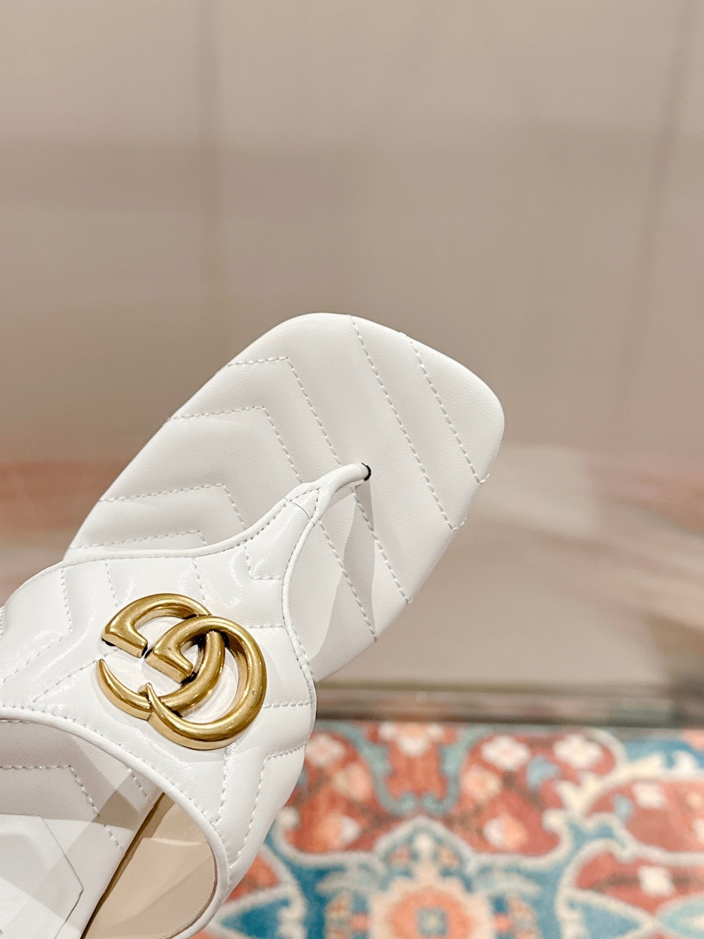 GUCCI HIGH THONG MULE 55MM IN WHITE CALFSKIN WITH GOLD HARDWARE