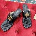 GUCCI HIGH THONG MULE 55MM IN BLACK CALFSKIN WITH GOLD HARDWARE