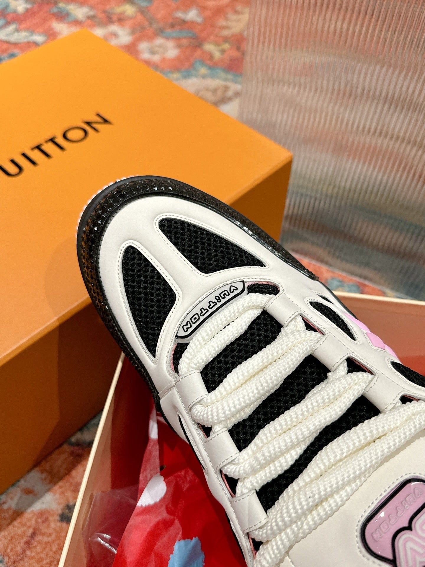 LOUIS VUITTON LV SKATE SNEAKER IN WHITE MIX BLACK AND LIGHT PINK CALFSKIN