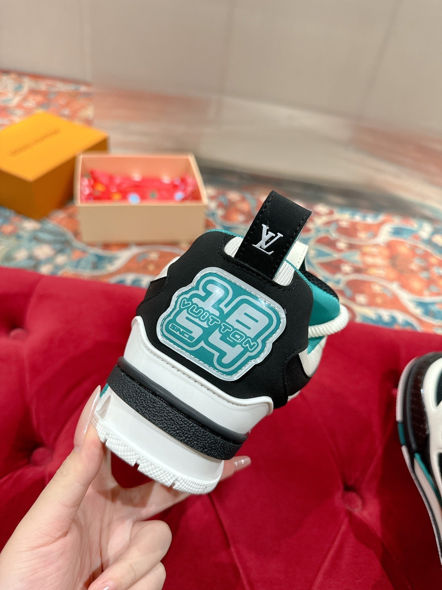LOUIS VUITTON LV SKATE SNEAKER IN WHITE MIX BLACK AND PERSIAN GREEN CALFSKIN