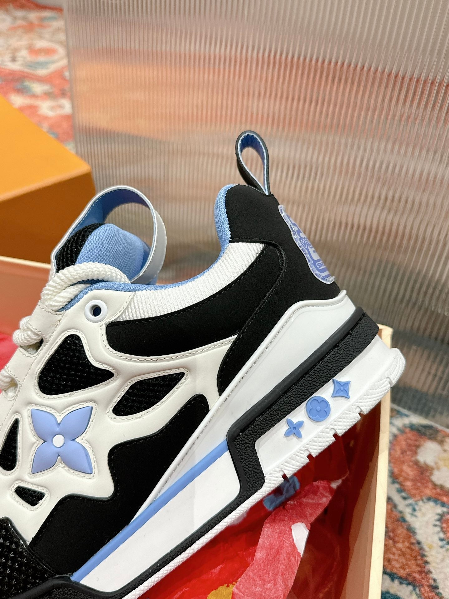 LOUIS VUITTON LV SKATE SNEAKER IN WHITE MIX BLACK AND SKY BLUE CALFSKIN