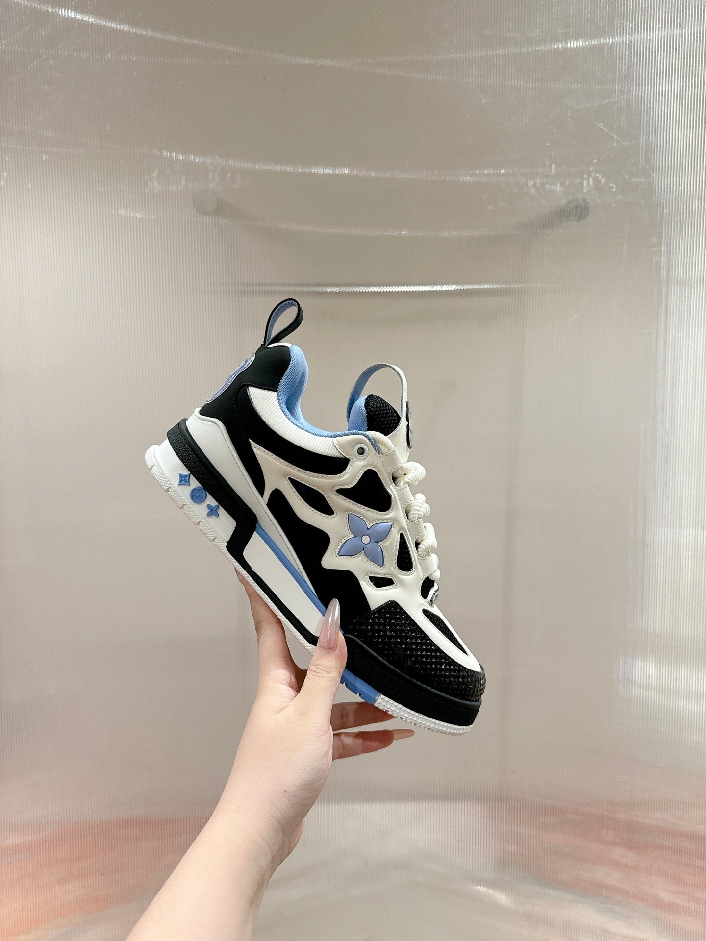 LOUIS VUITTON LV SKATE SNEAKER IN WHITE MIX BLACK AND SKY BLUE CALFSKIN