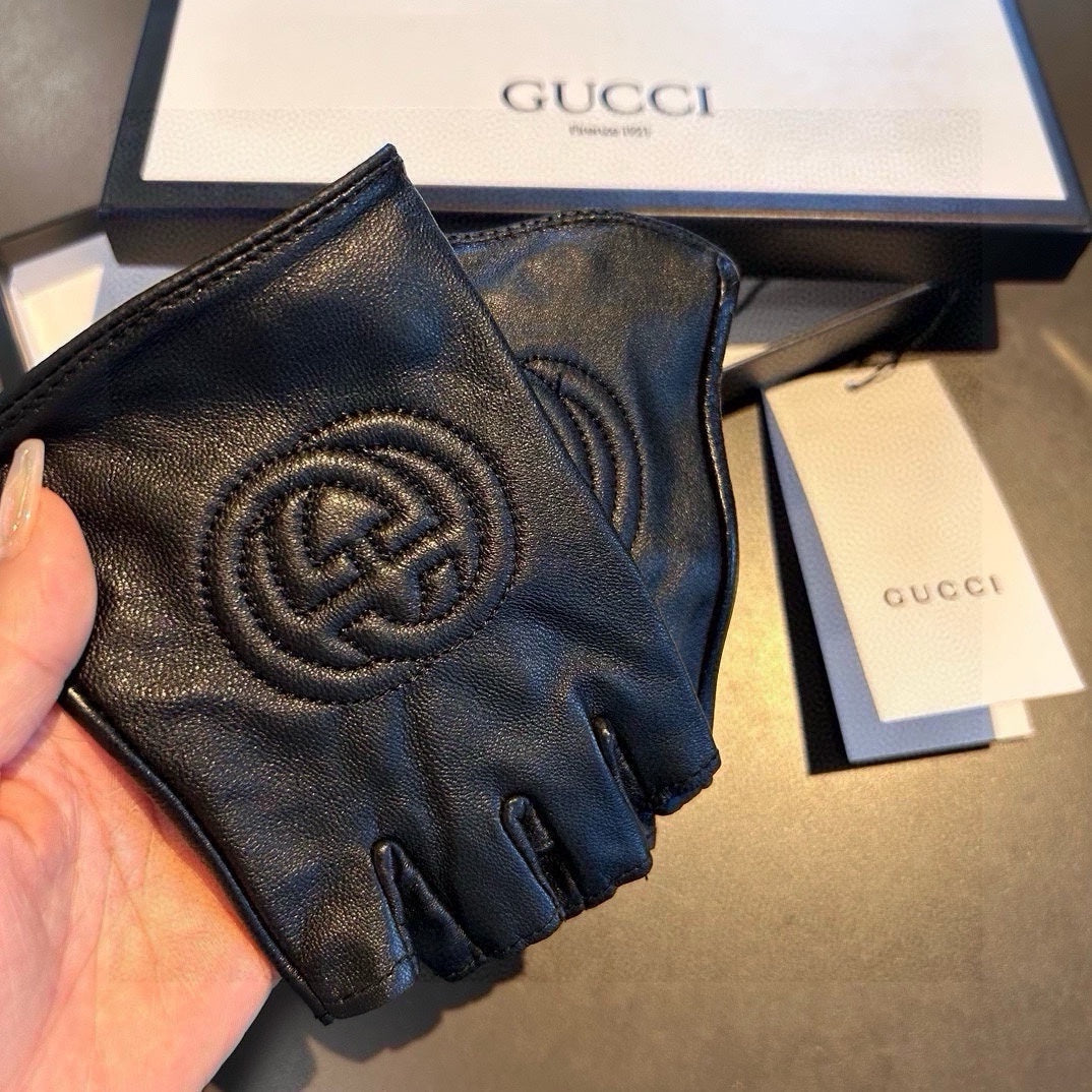 GUCCI FINGERLESS GLOVES IN BLACK LAMBSKIN AND CASHMERE LINING 465790