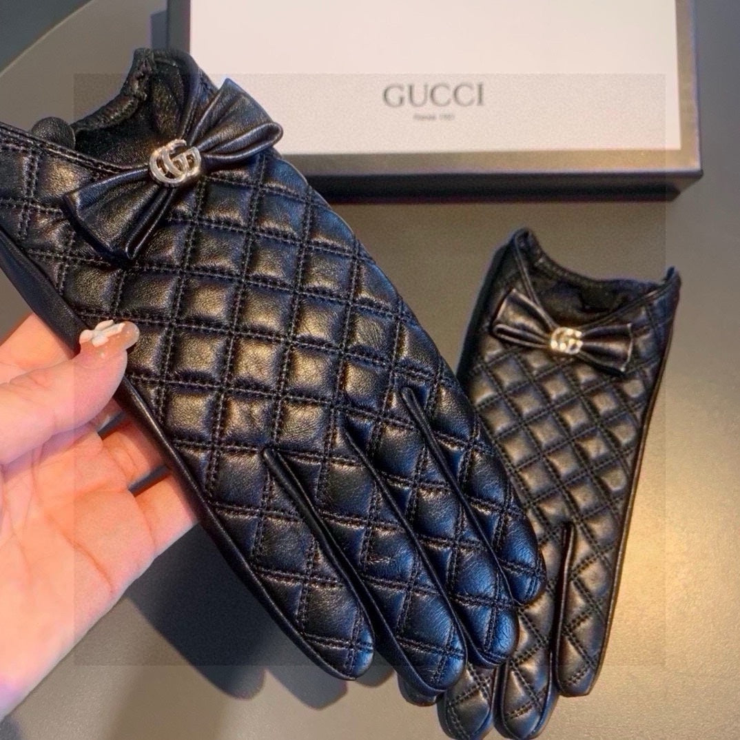 GUCCI TOUCHSCREEN GLOVES WITH BOW IN BLACK LAMBSKIN 467968