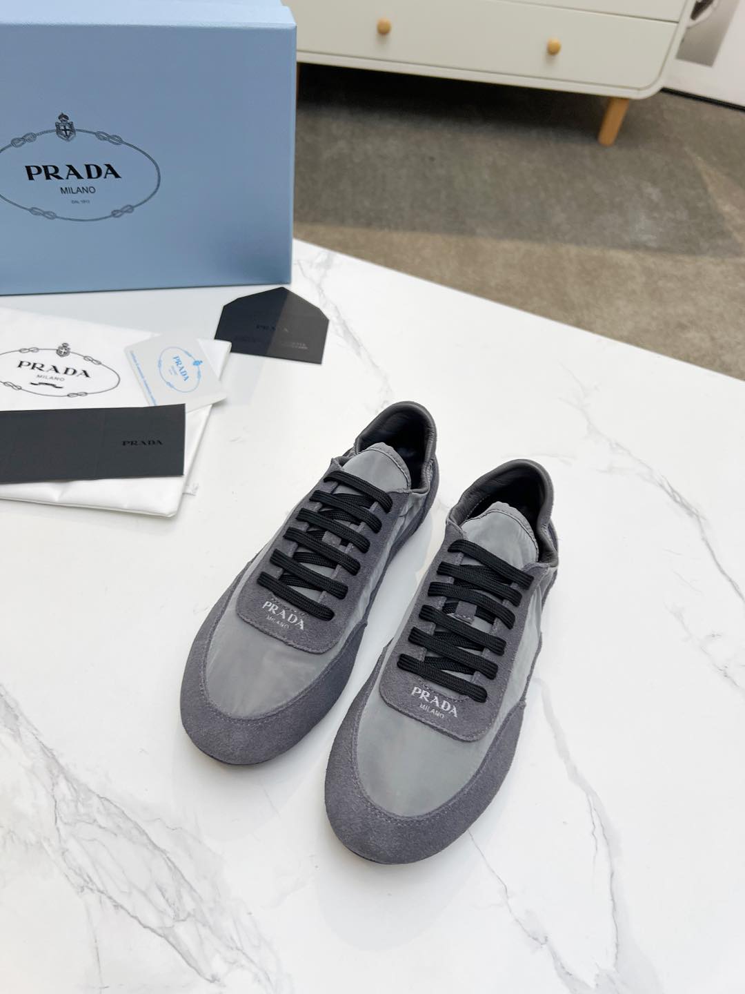 PRADA COLLAPSE SNEAKERS IN GRAY SUEDE AND NYLON