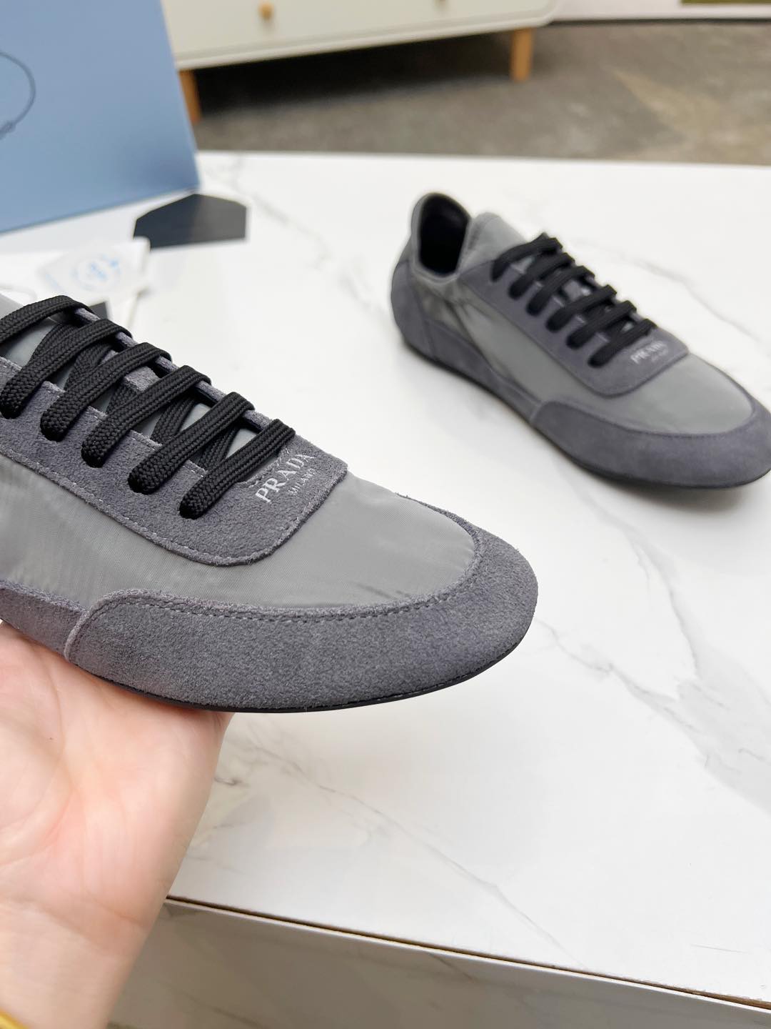PRADA COLLAPSE SNEAKERS IN GRAY SUEDE AND NYLON