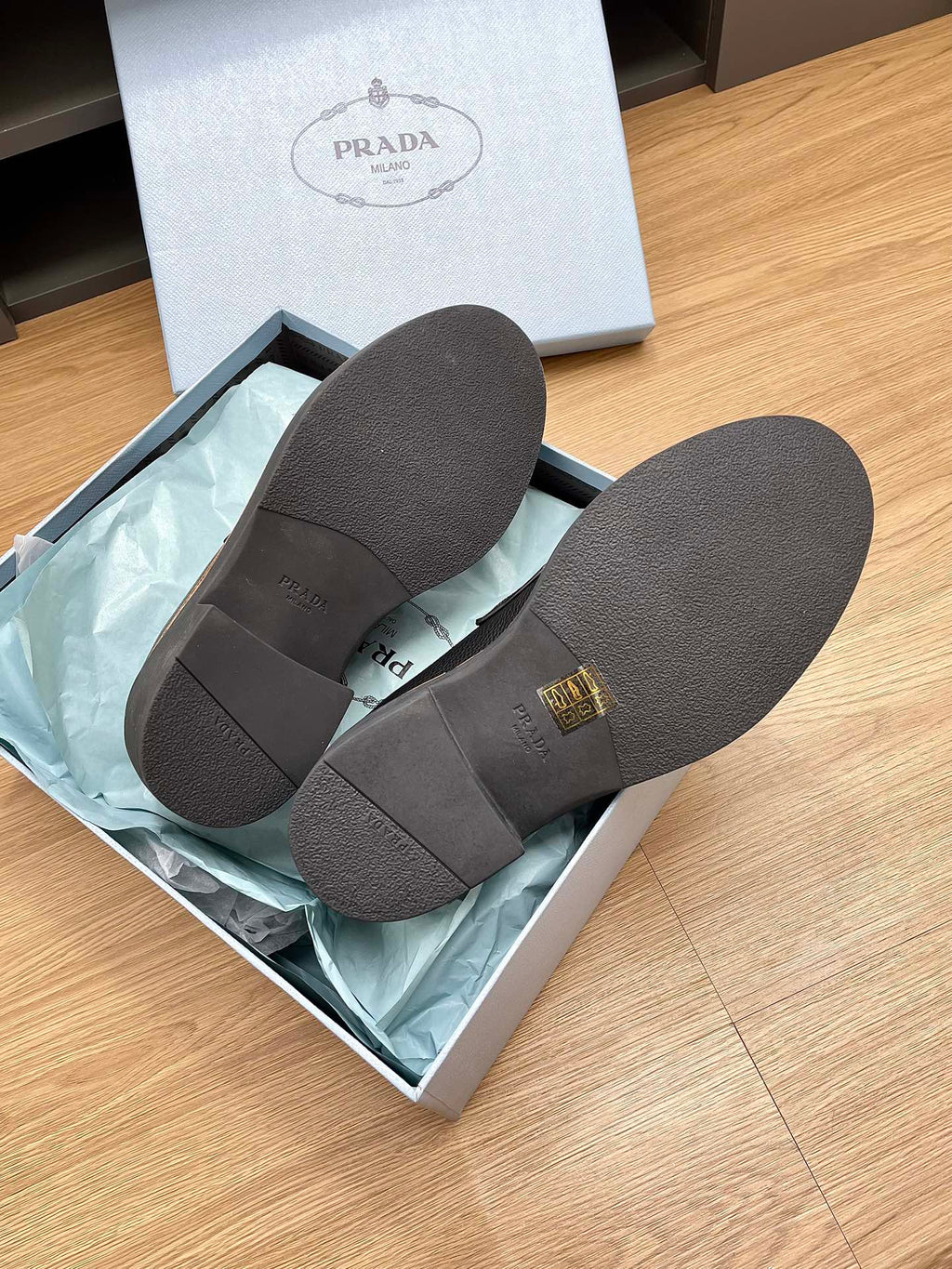 PRADA CHOCOLATE LOAFERS BLACK AND WHITE CALFSKIN