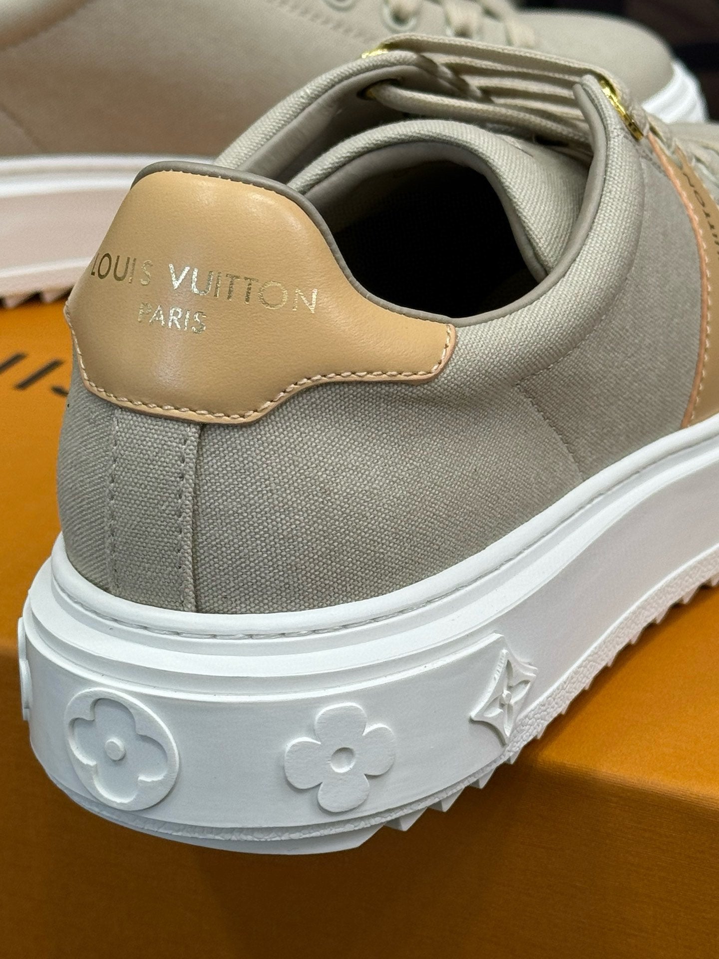 LOUIS VUITTON LV TIME OUT SNEAKER IN PASTEL GRAY MIX MACAROON GOLD CANVAS