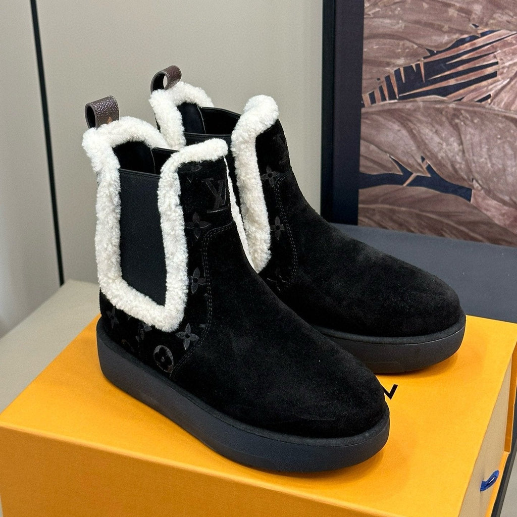 LOUIS VUITTON ASPEN CHELSEA ANKLE BOOTS IN BLACK MONOGRAM-DEBOSSED SUEDE
