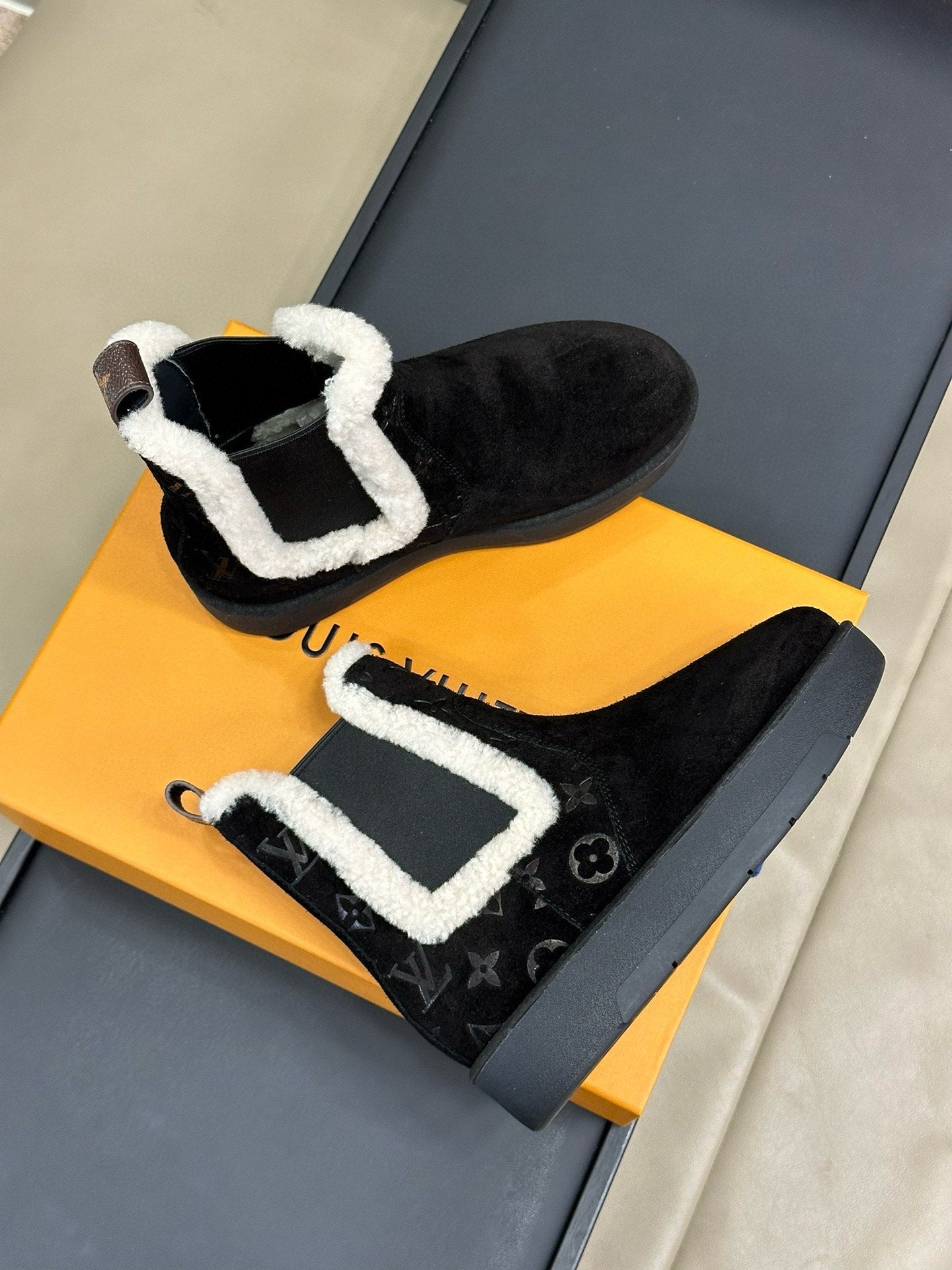 LOUIS VUITTON ASPEN CHELSEA ANKLE BOOTS IN BLACK MONOGRAM-DEBOSSED SUEDE