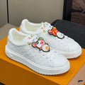 LOUIS VUITTON TIME OUT SNEAKER IN WHITE EMBOSSED MONOGRAM CALFSKIN