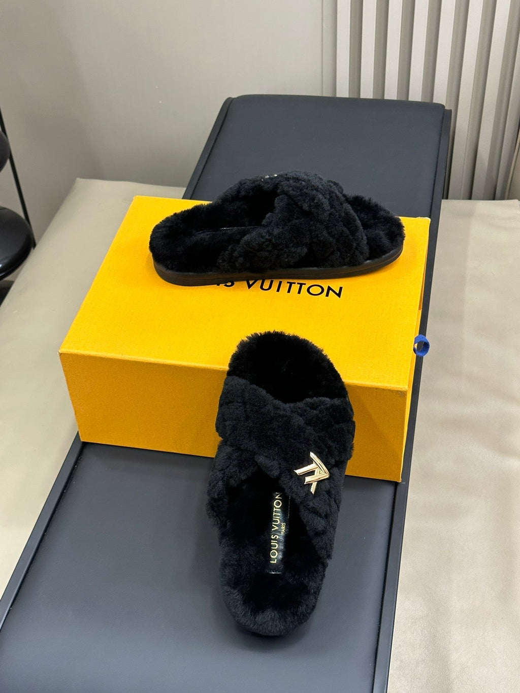 LOUIS VUITTON LV WOMEN'S SUNSET COMFORT FLAT MULE IN BLACK FLEECE