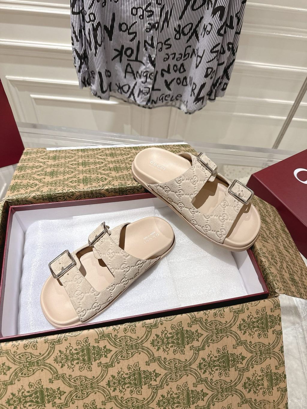 GUCCI SANDALS IN NUDE BEIGE SUEDE EMBOSSED LOGO SILVER HARDWARE