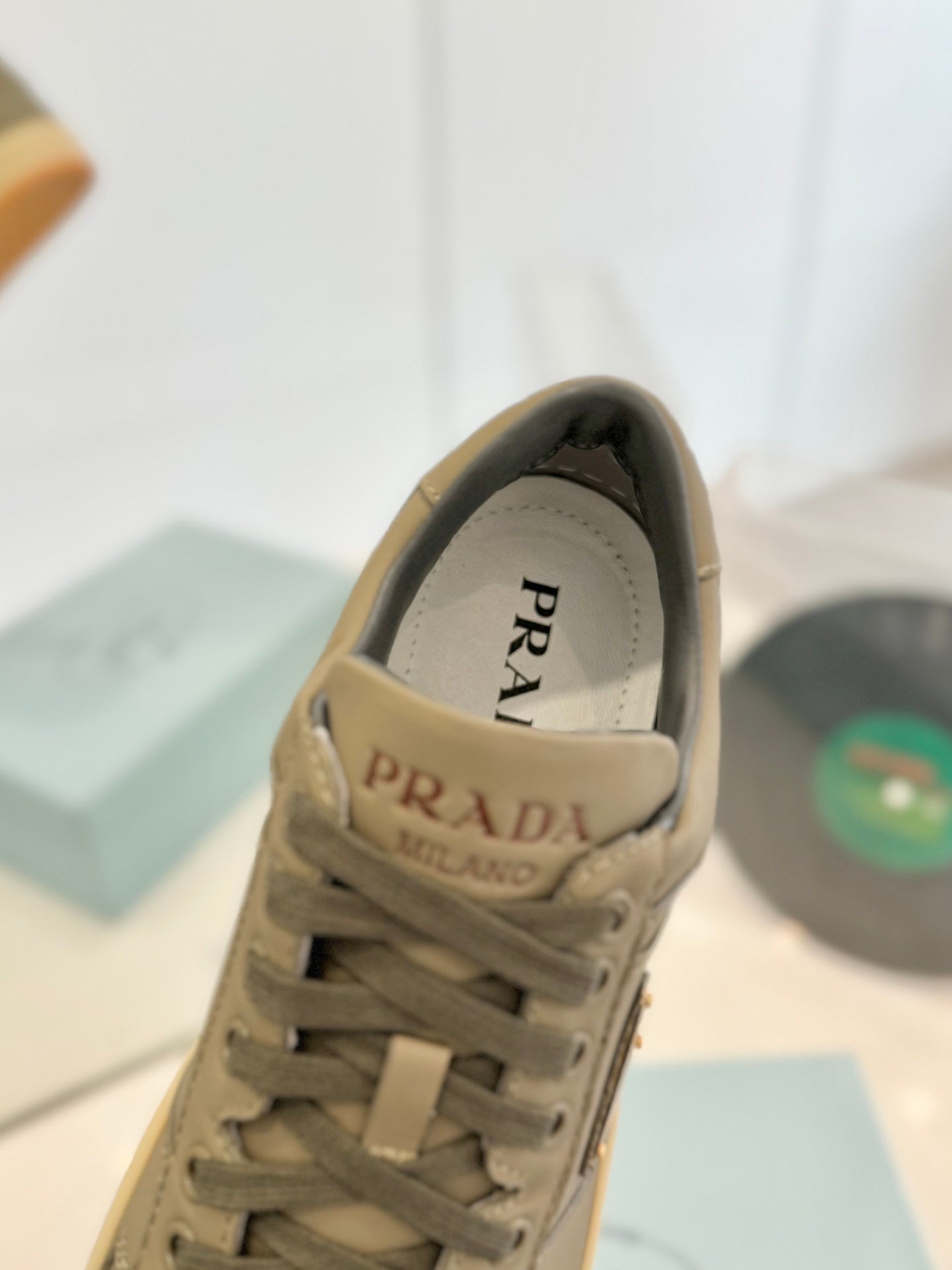 PRADA DOWNTOWN PERFORATED SNEAKERS OLIVE CALFSKIN