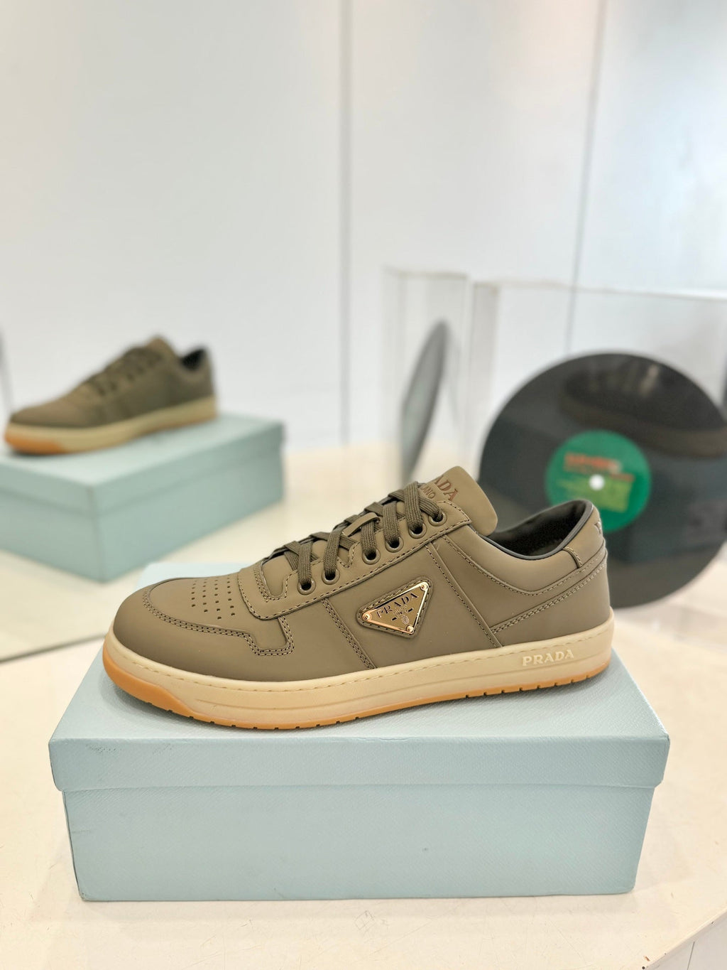 PRADA DOWNTOWN PERFORATED SNEAKERS OLIVE CALFSKIN