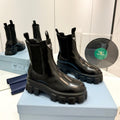 PRADA MONOLITH BRUSHED LEATHER BOOTIES BLACK