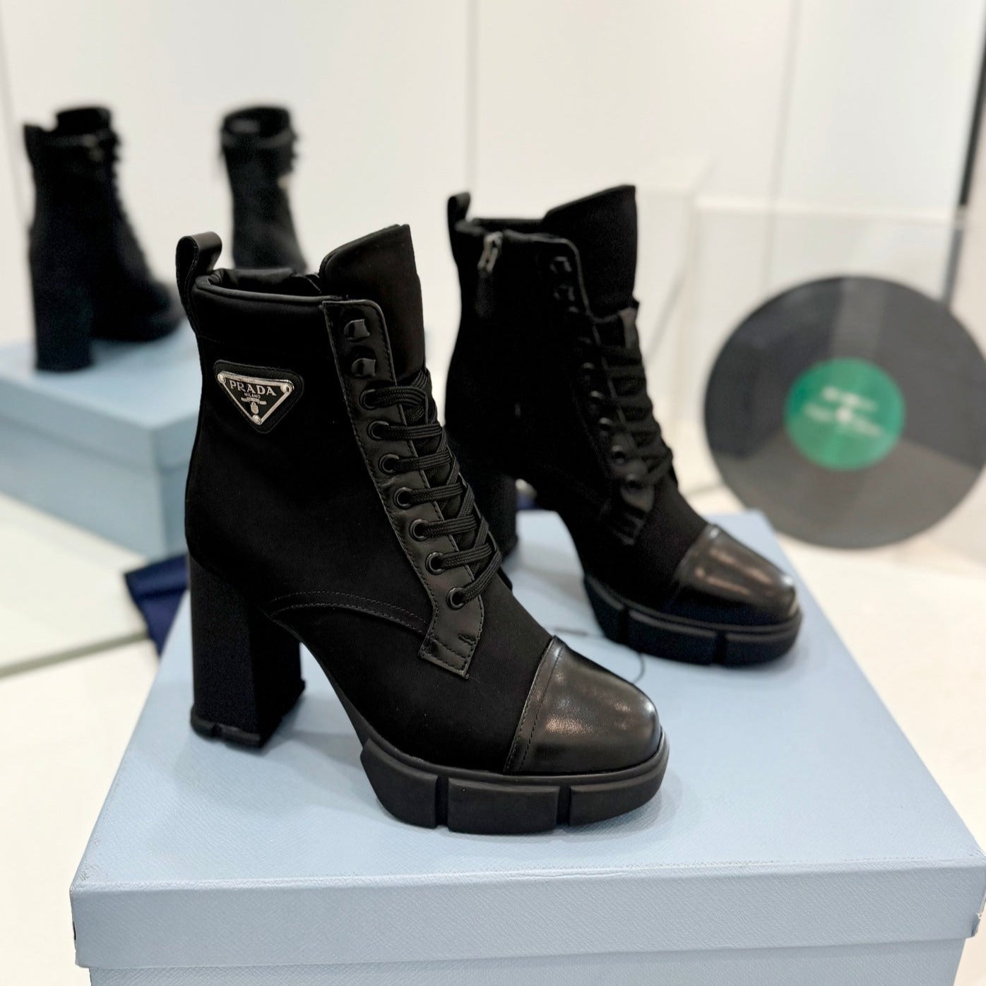 PRADA RE-NYLON AND LEATHER BOOTIES BLACK