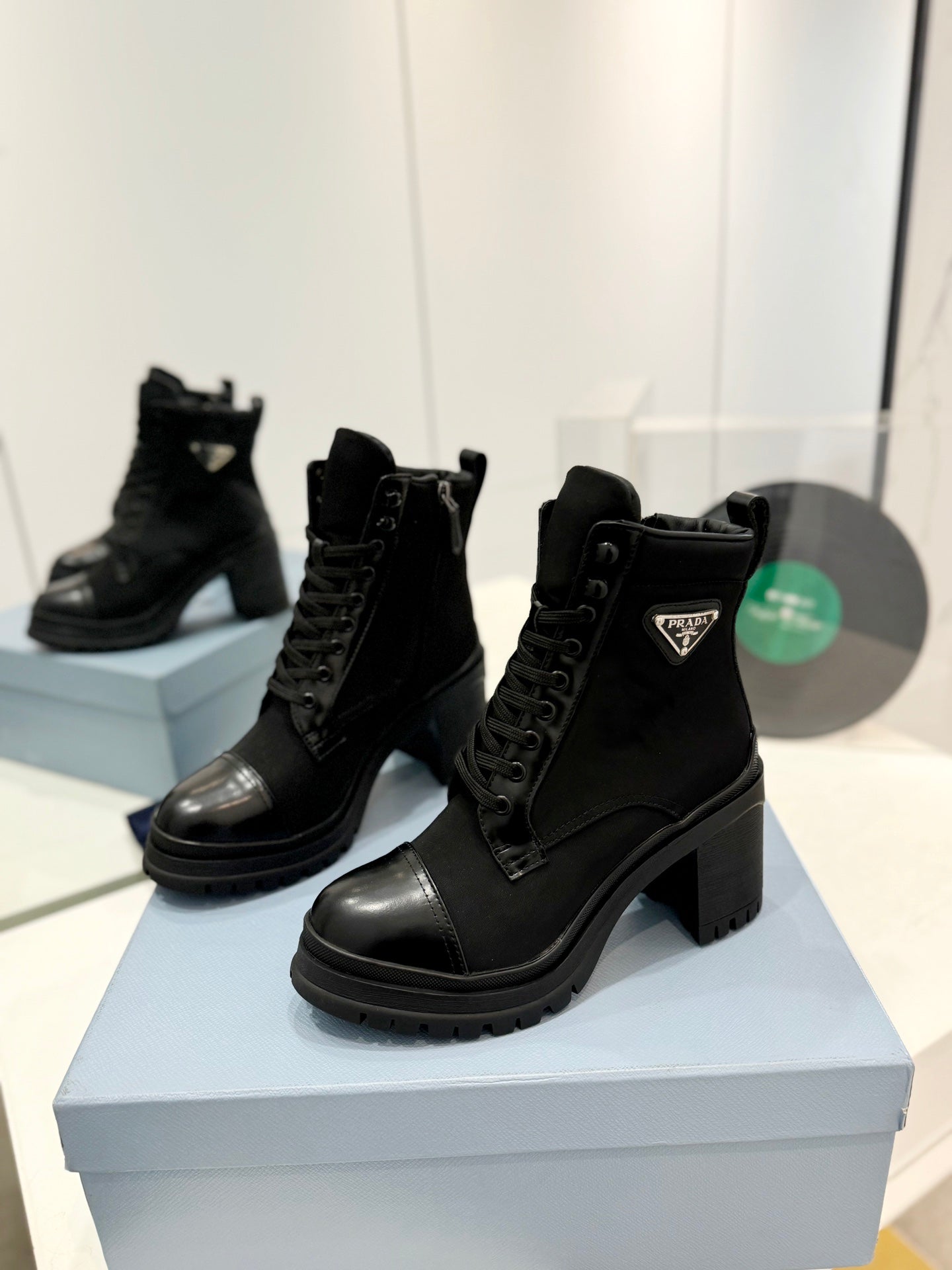 PRADA BRUSHED LEATHER AND RE-NYLON LACED BOOTIES BLACK